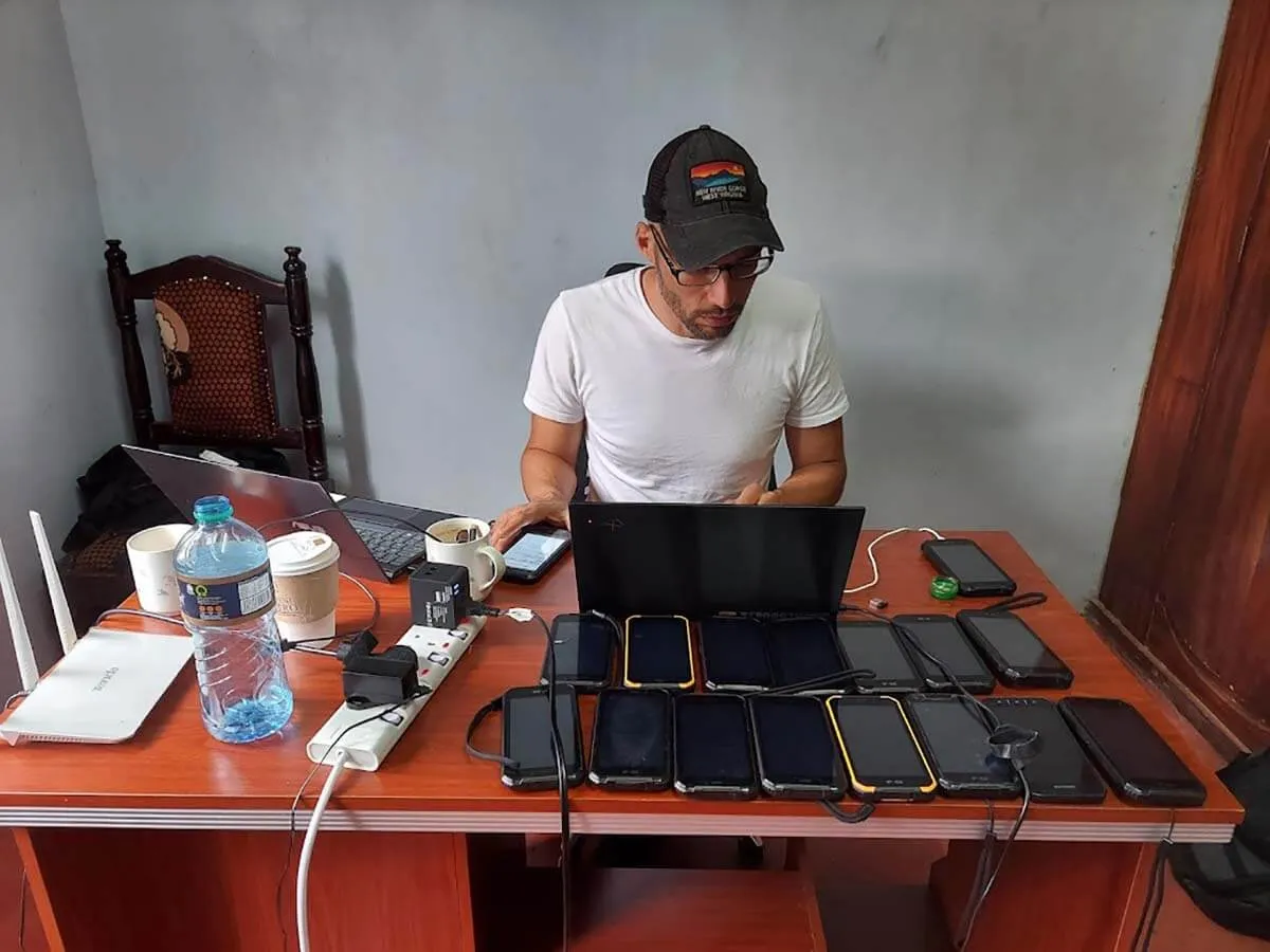 Debugging smartphones during a participatory mapping project with the Ogiek of Mount Elgon
          in Chepkitale, Kenya.
